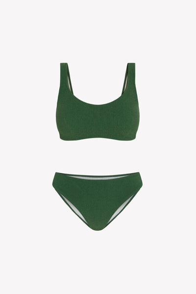 Bikini sostenible Mani Bimba Palm de CIRCU. Top deportivo con tiras anchas y opción de copas, y braga de cobertura normal. Tejido reciclado 100% ECONYL® en verde oscuro mediterráneo con textura atoallada. Hecho artesanalmente en España.